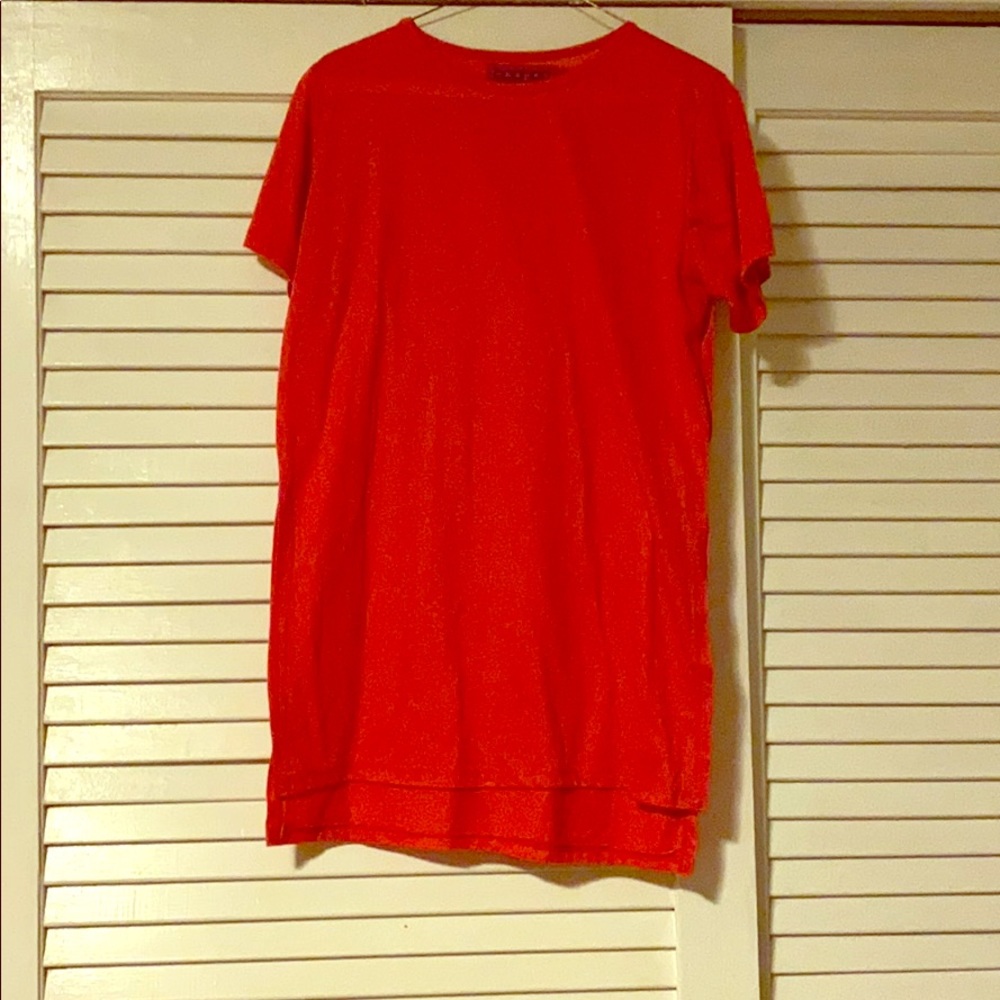 Tag says size 12 but fits like a medium shirt.